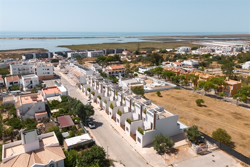 3 bedroom semi-detached villa with pool and views of the sea and Ria Formosa