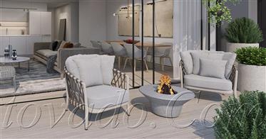 Un nouvel appartement calme et haut de gamme avec une grande terrasse ensoleillée face à une vue mag