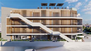 Apartamentos T2 em construção com garagem piscina na cobertura com vista mar e de elevada qualidade 