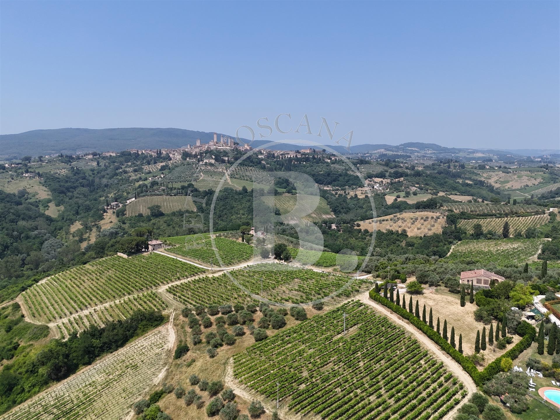 Beautifully renovated stone country house with a view of the towers of San Gimignano. 