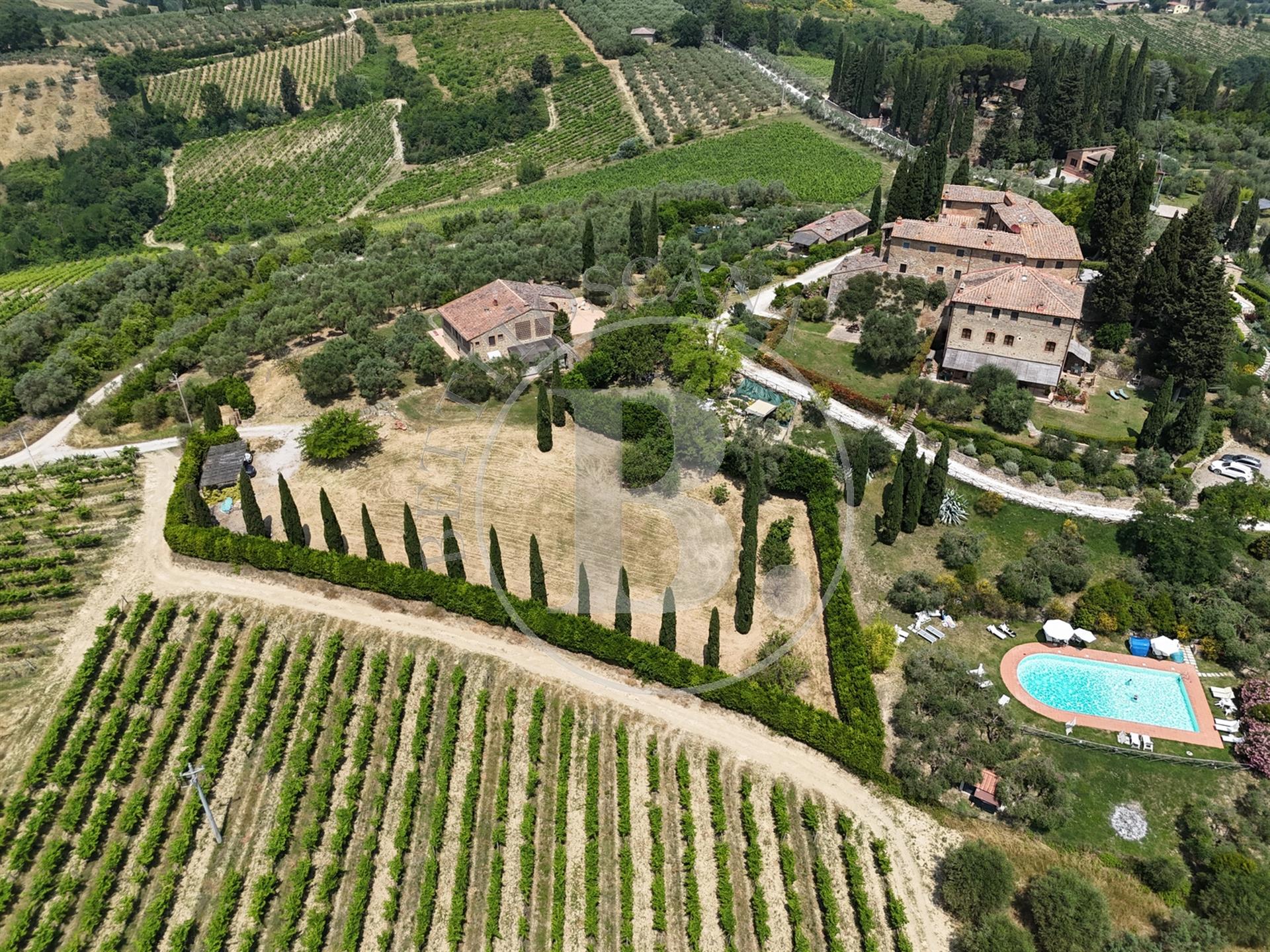 Beautifully renovated stone country house with a view of the towers of San Gimignano. 