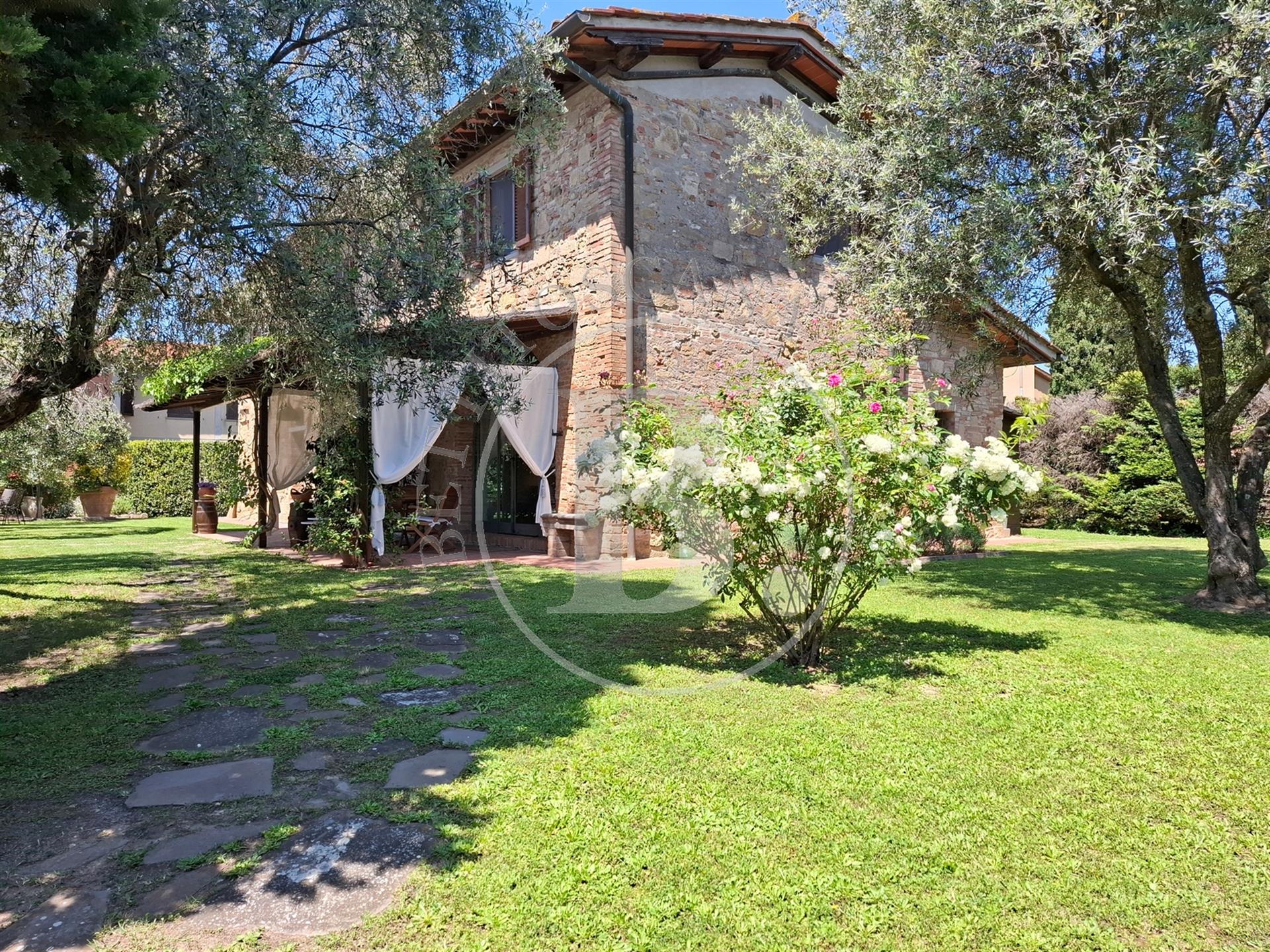 Xvii Century farmhouse with a restored barn set in a Tuscan countryside setting with the convenience