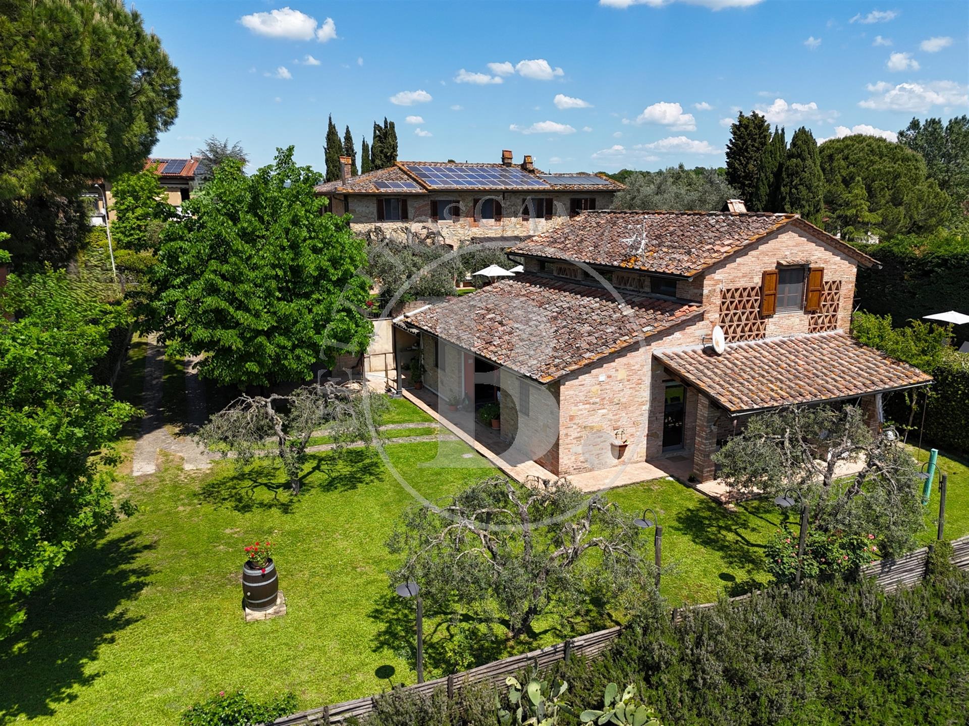 Xvii Century farmhouse with a restored barn set in a Tuscan countryside setting with the convenience