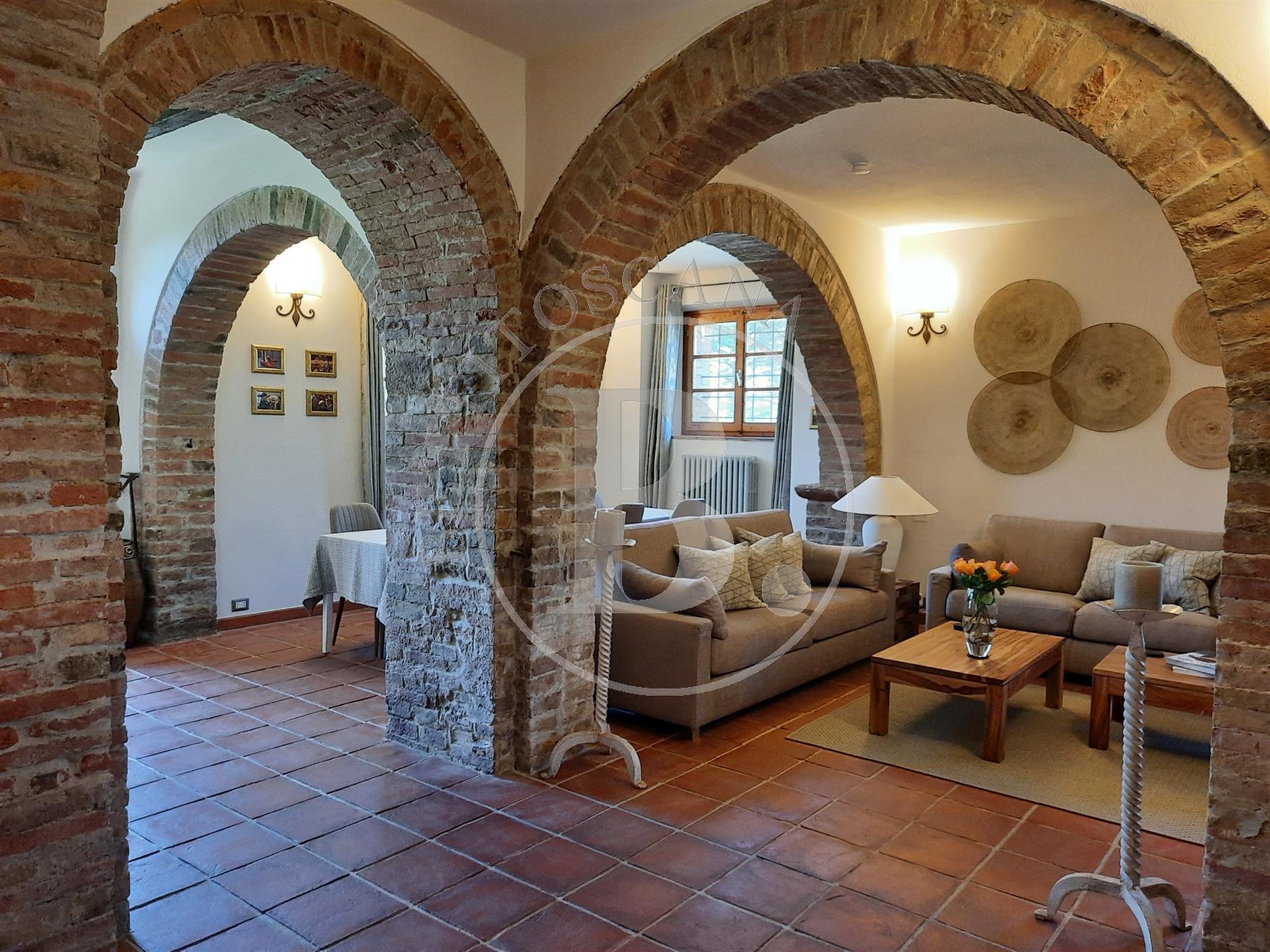 Xvii Century farmhouse with a restored barn set in a Tuscan countryside setting with the convenience