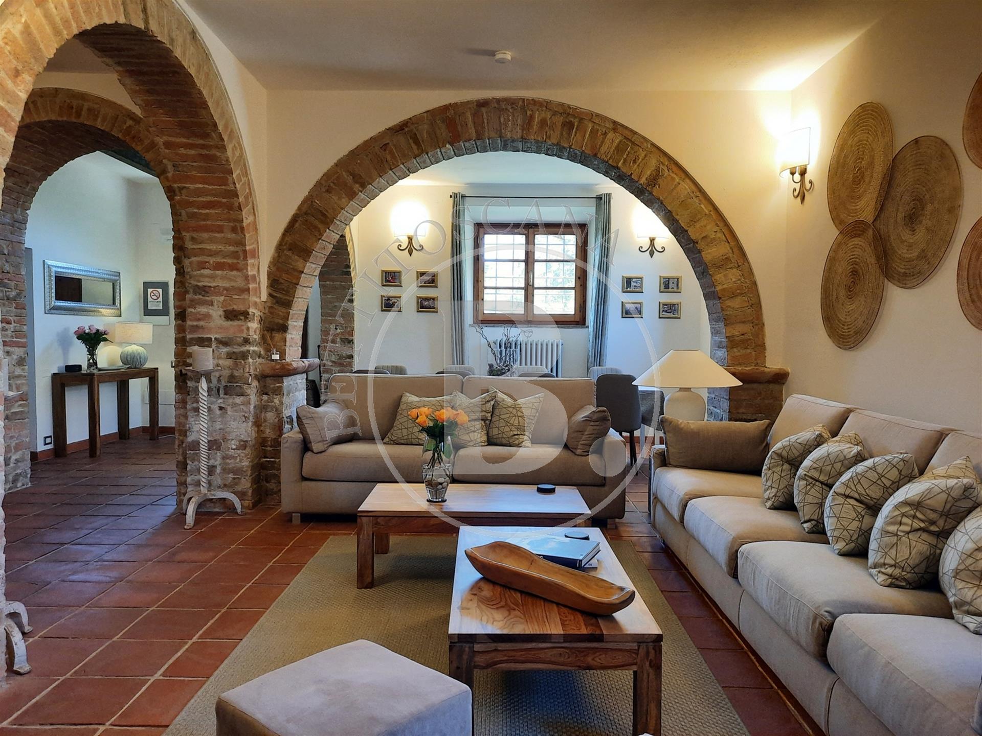 Xvii Century farmhouse with a restored barn set in a Tuscan countryside setting with the convenience