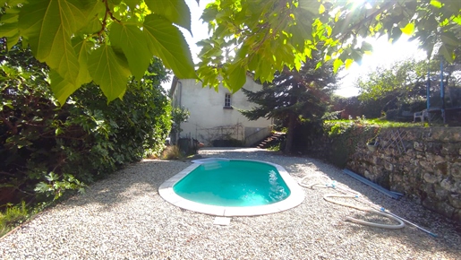House with possibilities of 2 dwellings, swimming pool, garden, quiet close to shops and river.