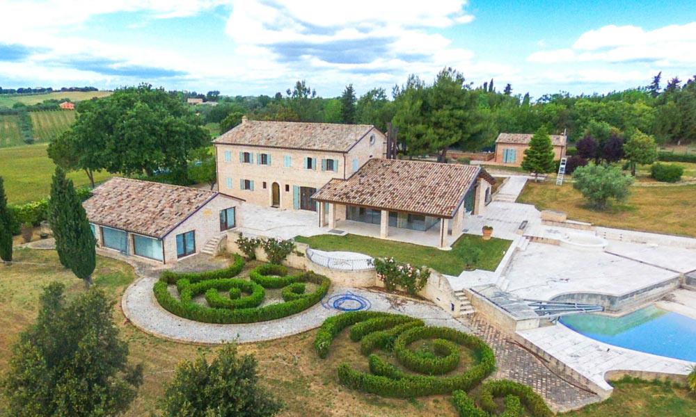 This majestic villa in central Marche, formerly a traditional farmhouse, offers style, quality, plen