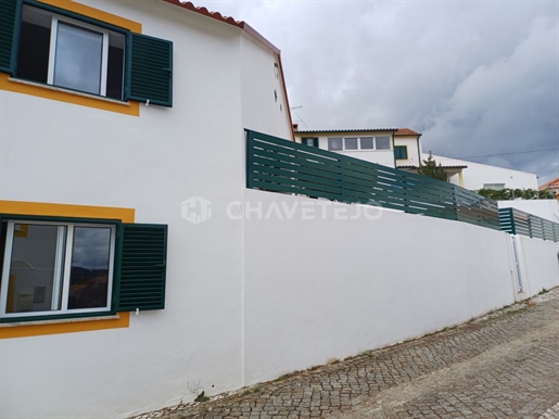 A totally renovated three-bedroom house in the old part of Vila de Rei.