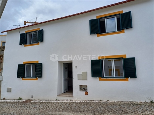 A totally renovated three-bedroom house in the old part of Vila de Rei.