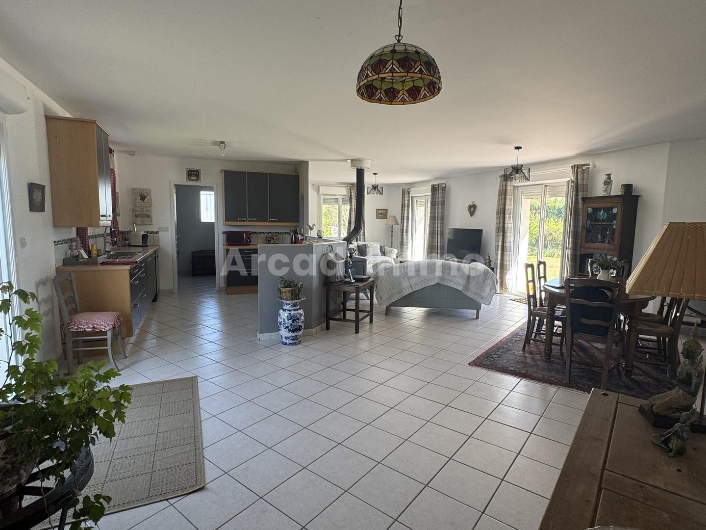 Spacious single-storey house with a lovely terrace, enclosed garden and garden shed.