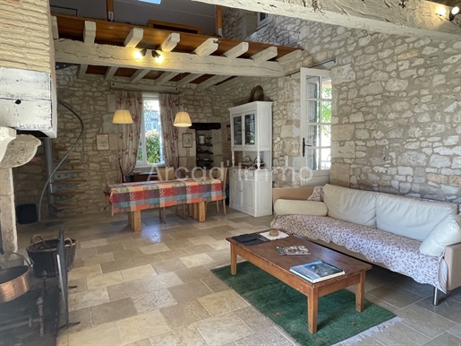 Very nice stone house with a lot of charm and character, 3 bedrooms, courtyard and some grounds of 1