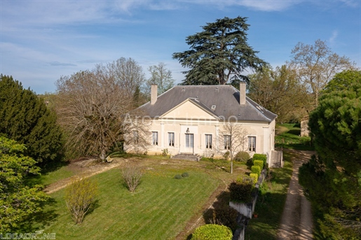Maison bourgeoise with its second house and two outbuildings set in approx. 1.5 ha of wooded parklan