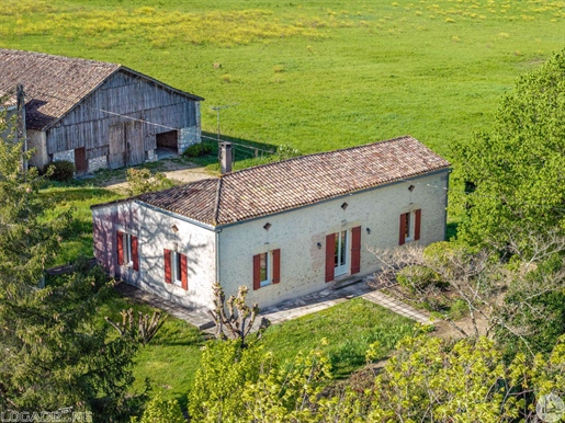 Single stone house with barn