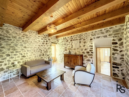 A charming renovated stone village house of 100 m2 of living space with a terrace.