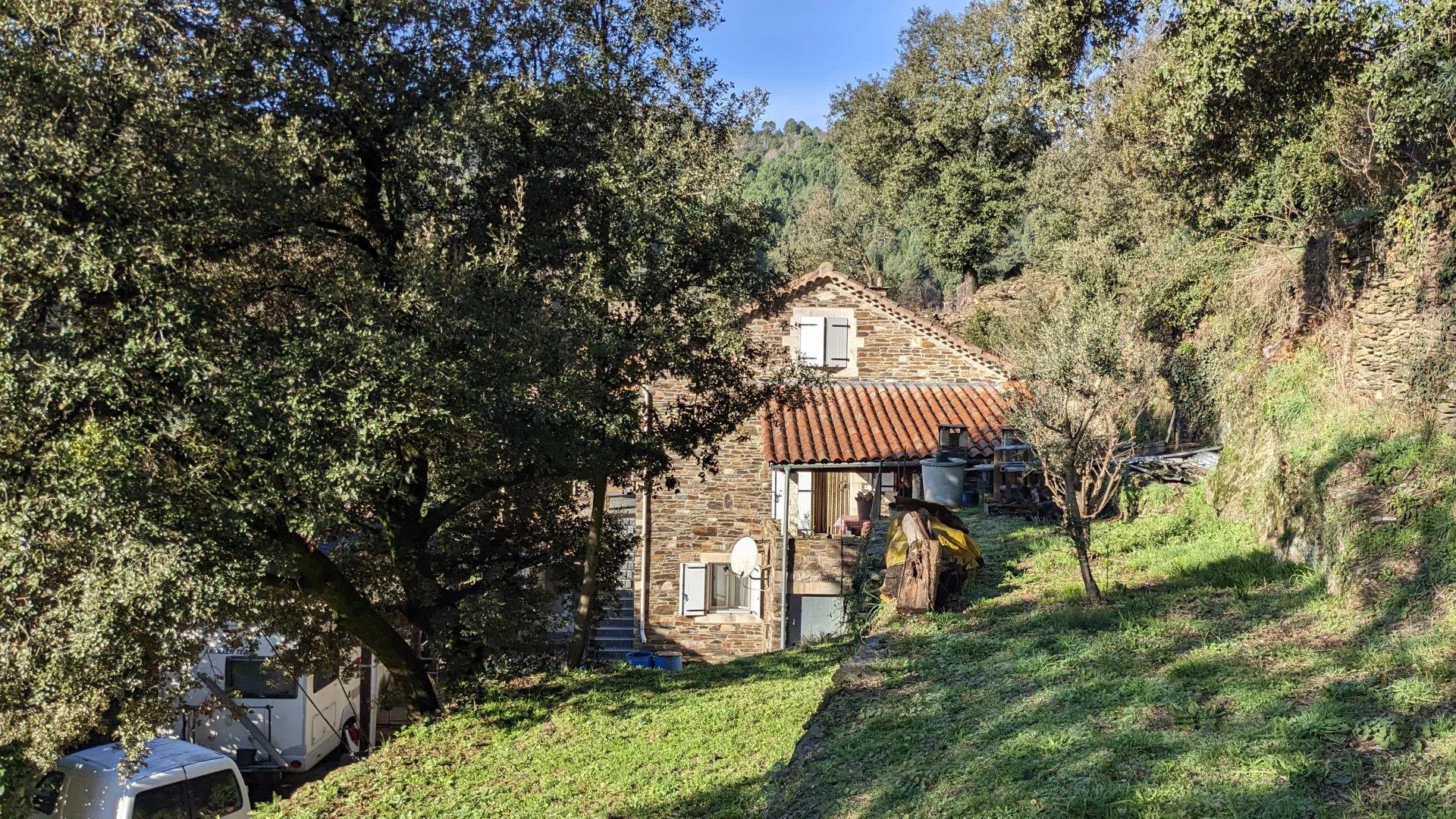 Comfortable house with land and view