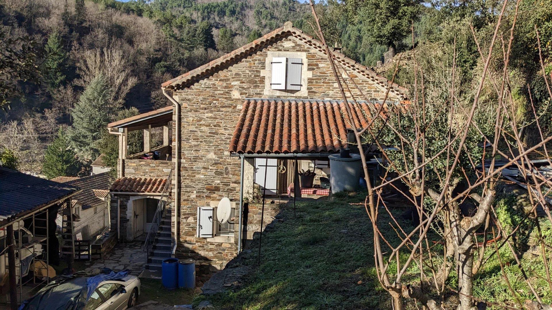 Comfortable house with land and view