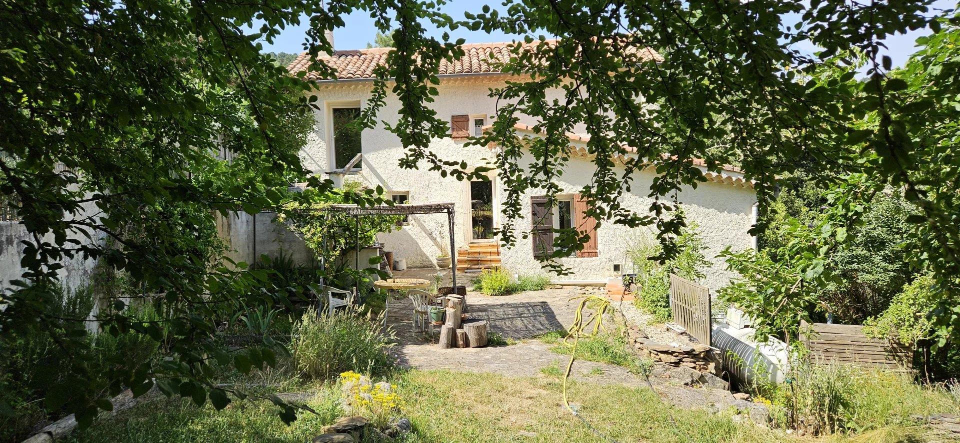 Renovated house, studio, land and views