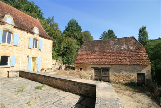 Stone building with barn