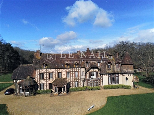 Romantic french chateau surrounded by vast woodland teeming with game in Perche region