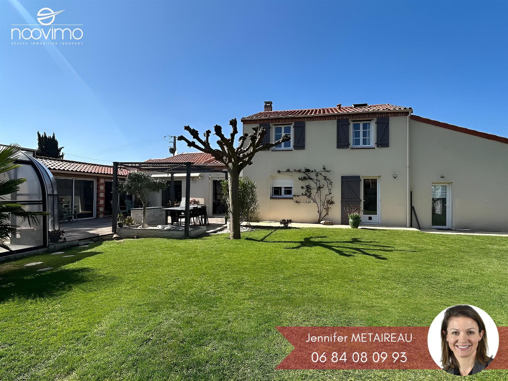 Family home with single-story living, indoor pool and separate studio