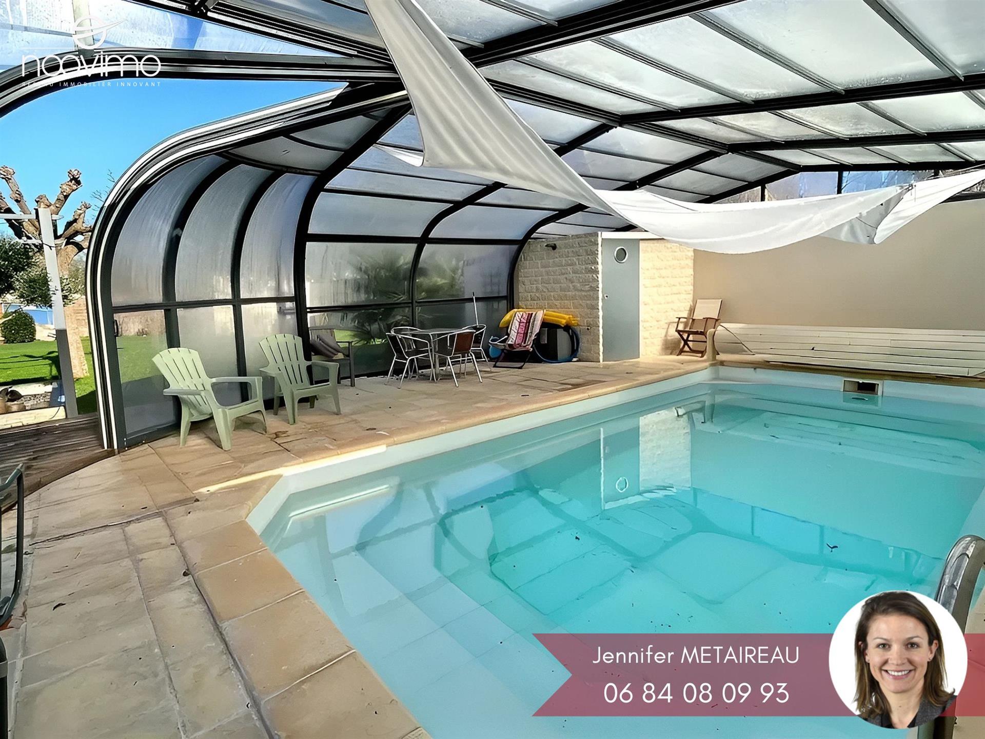Family home with single-story living, indoor pool and separate studio