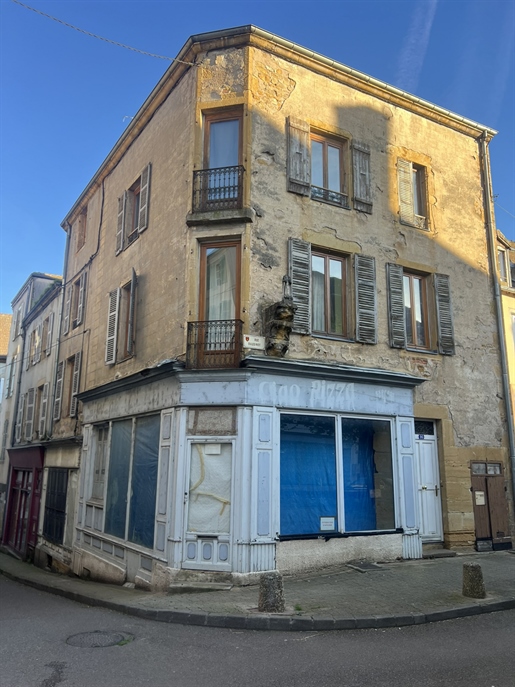 Charolles city center building with commercial premises and a duplex apartment