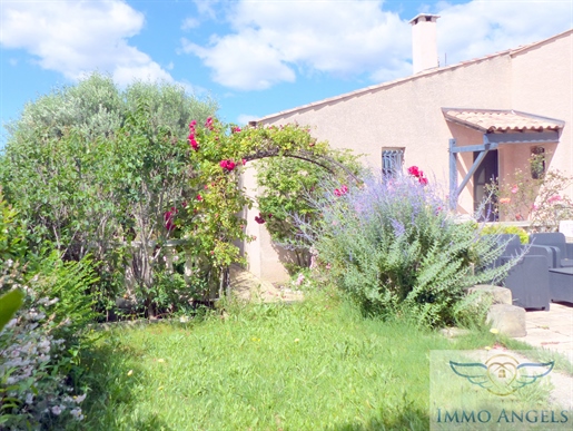 Maison T5 de 110m2 avec garage et piscine sur un terrain de 600m2.