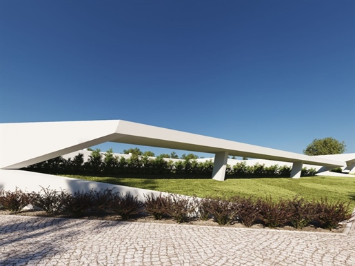 Villa avec 4 chambres, jardin, piscine et garage, conçue par Gonçalo Byrne, à Bom Sucesso Resort
