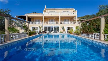 Classical very spacious family villa in a quiet residential location offering beautiful sea views an