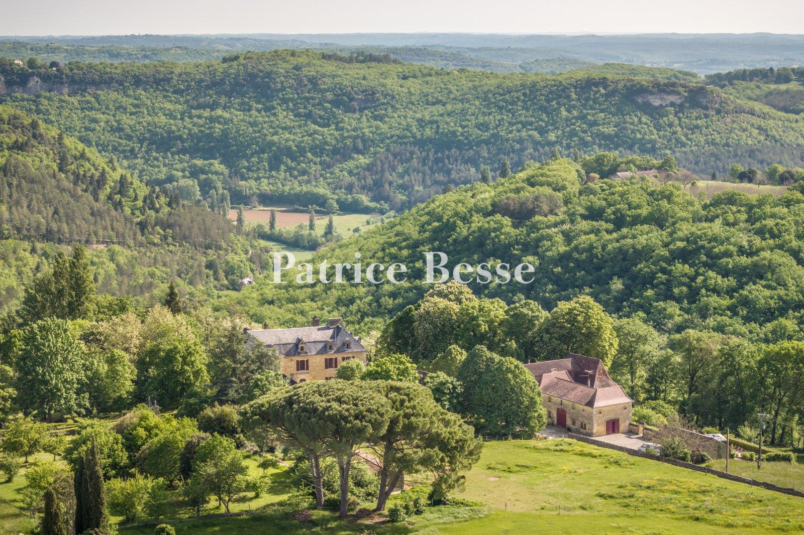 A chateau from the late 17th century, with breath-taking views, outbuildings and 38 hectares of wood