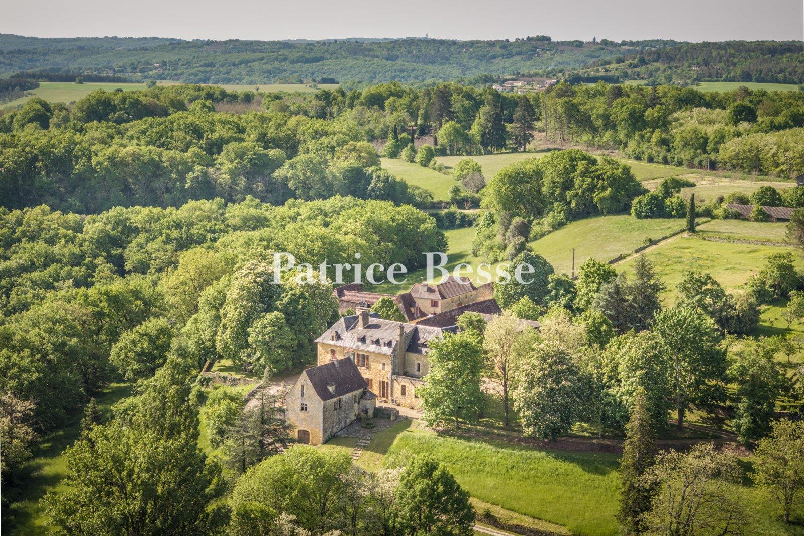 A chateau from the late 17th century, with breath-taking views, outbuildings and 38 hectares of wood
