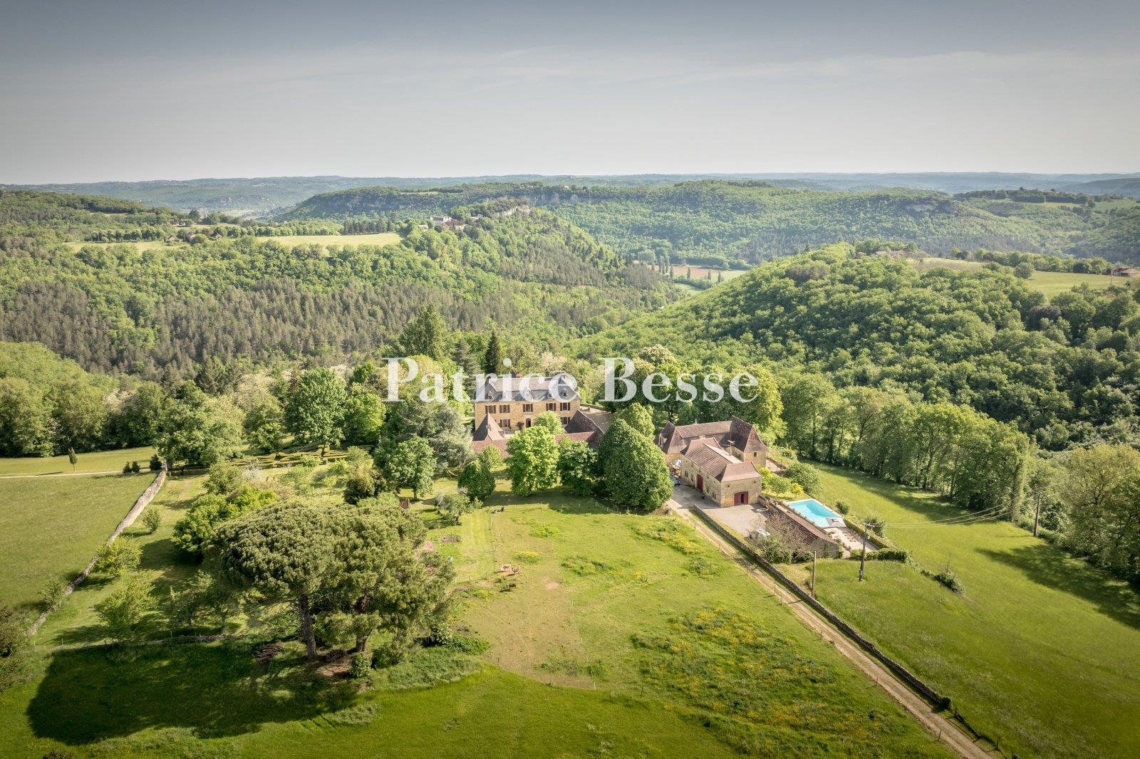 A chateau from the late 17th century, with breath-taking views, outbuildings and 38 hectares of wood