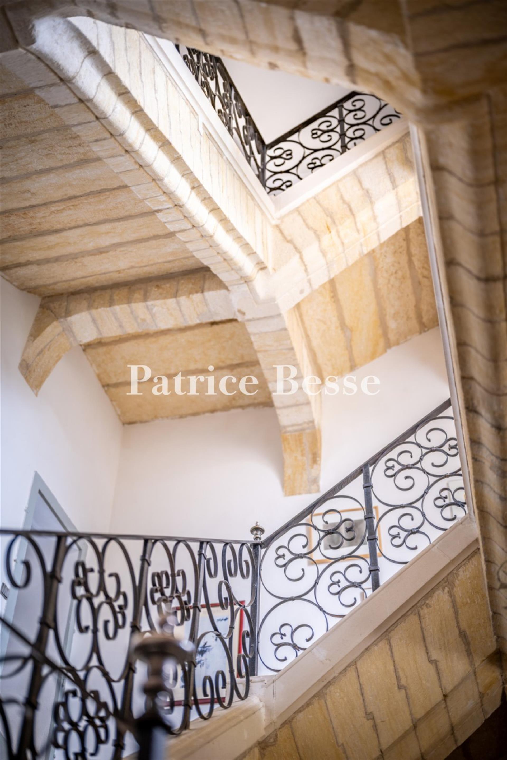 A chateau from the late 17th century, with breath-taking views, outbuildings and 38 hectares of wood