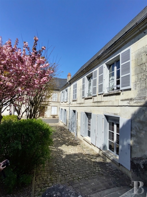An 18th century mansion house, with an interior courtyard and a terraced garden, in the Touraine reg