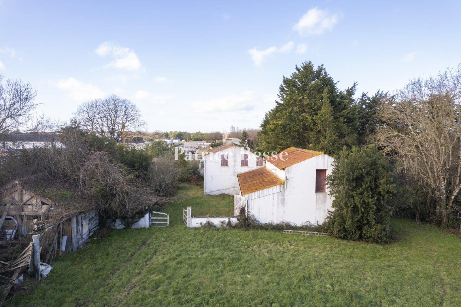 A house and its barn waiting to be renovated, nestled on Oléron Island on around four hectares of a