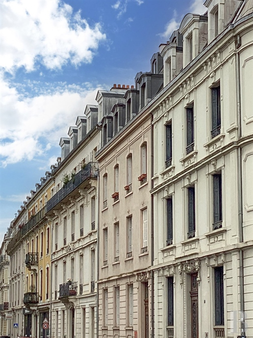 Offices in an elegant 19th-century edifice in Mulhouse city centre, opposite a park.