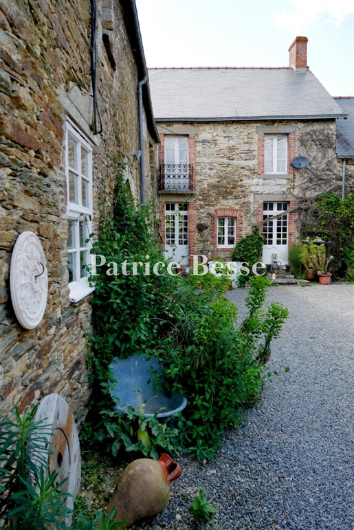 South of Rennes, in a five hectare estate, a 15th and 19th century manor house with outbuildings and