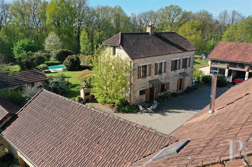 A renovated former farmhouse, guest house, outbuildings and swimming pool surrounded by 16 5 hectare