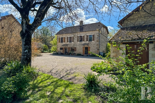 A renovated former farmhouse, guest house, outbuildings and swimming pool surrounded by 16 5 hectare