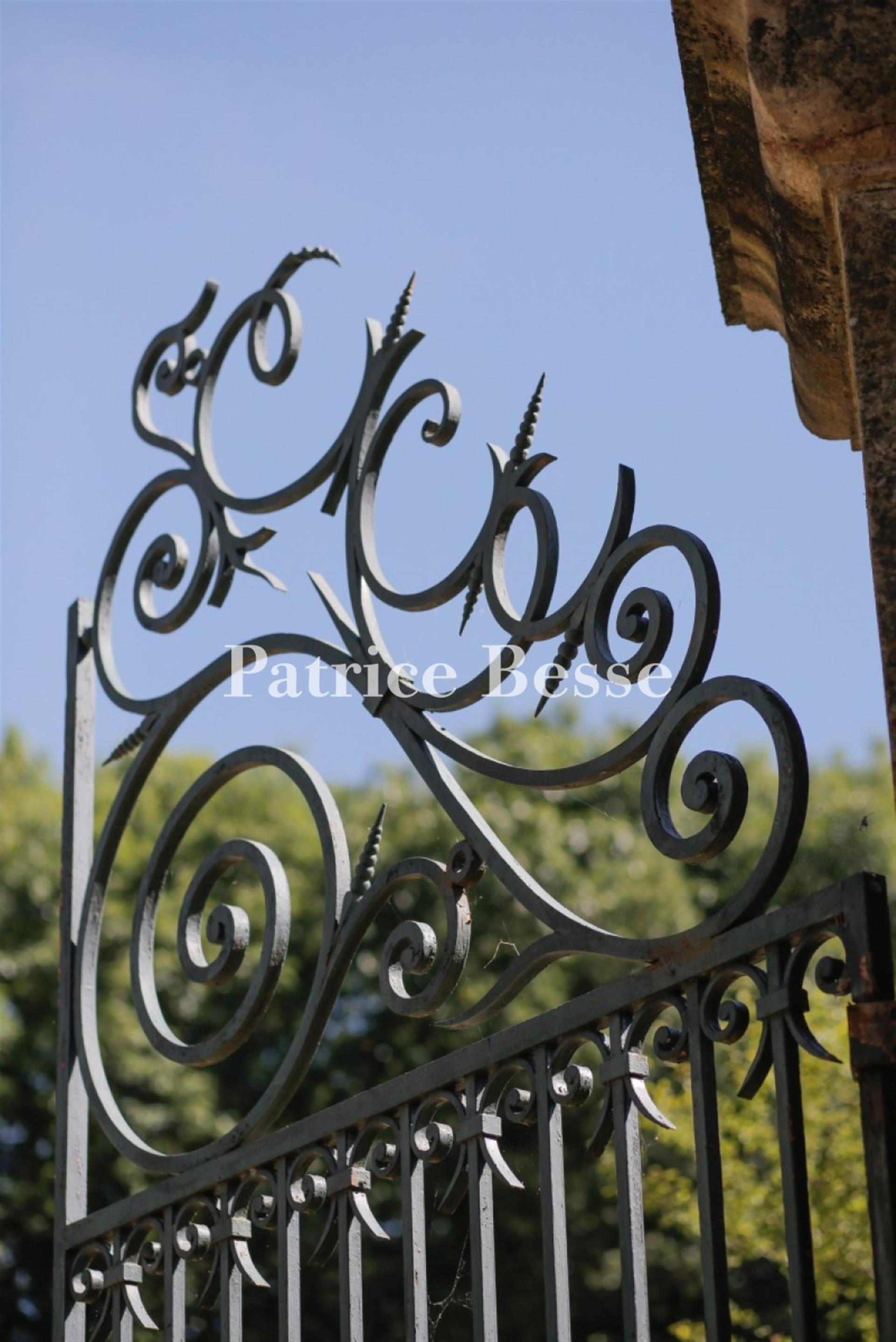 A large, 18th & 19th century, rural estate, with a chateau and outbuildings in 14 ha of parklands, m