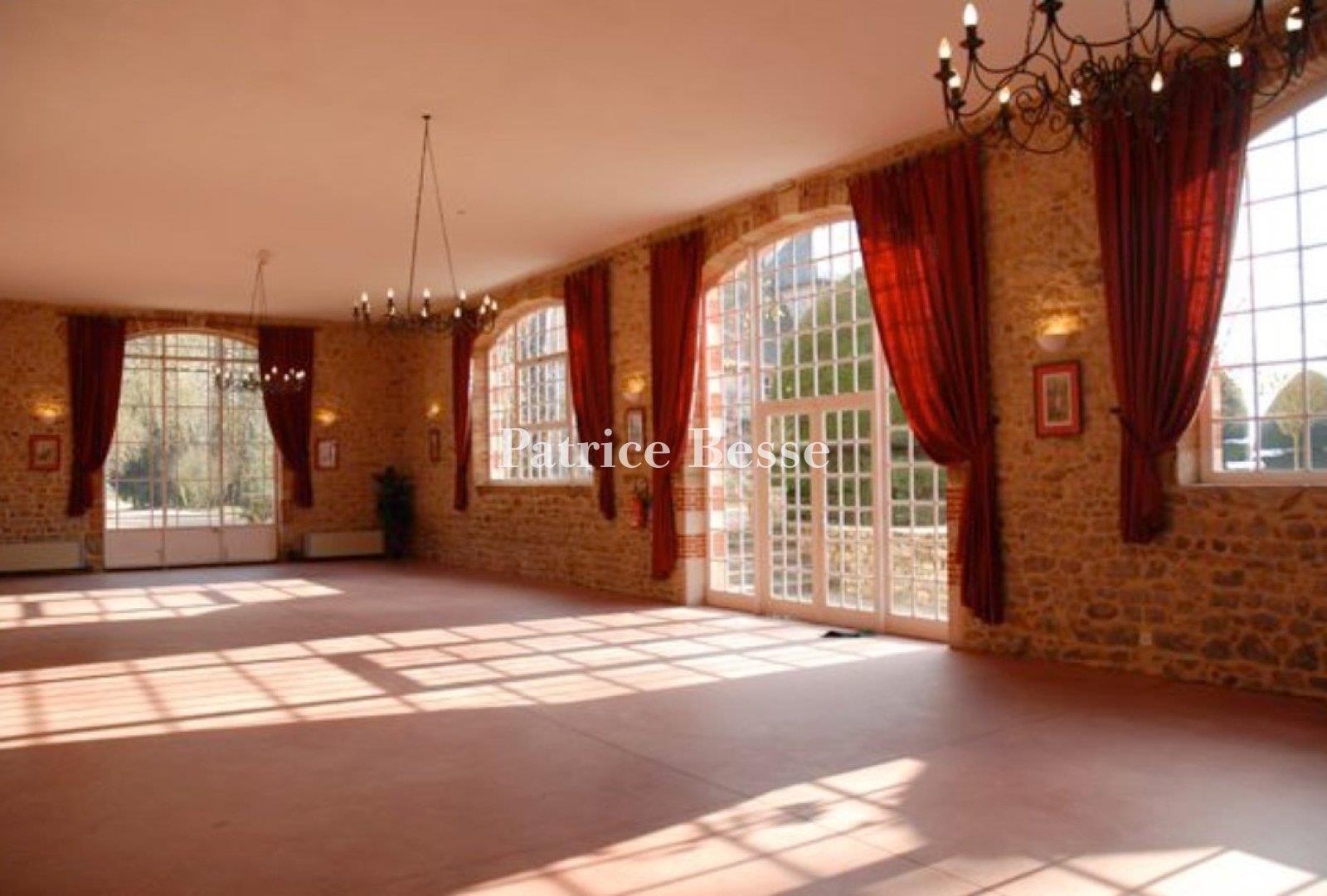 A large, 18th & 19th century, rural estate, with a chateau and outbuildings in 14 ha of parklands, m