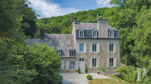 In the south of Calvados, 2 km from the centre of Vire, a 17th and 18th century mansion on the banks