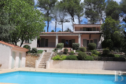 A modern Provençal house with over two hectares of terraced grounds in a calm, shady spot near the q