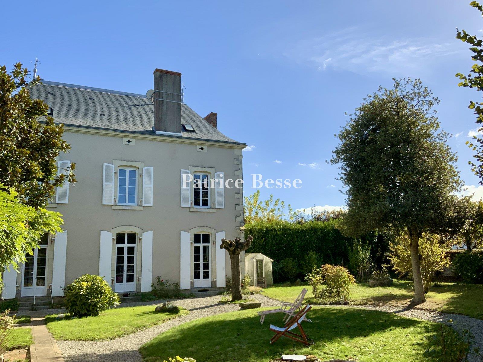 A grand nineteenth-century house with a garden and annexe in a historical town in the south of Franc