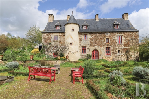 A renovated 15th-century Breton manor with vast grounds and a medieval garden, nestled between Lamba
