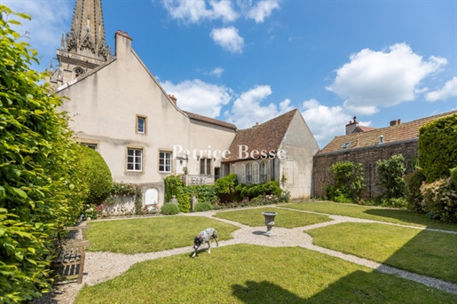 A former 15th century canon's house and its French formal garden at the foot of Autun cathedral.