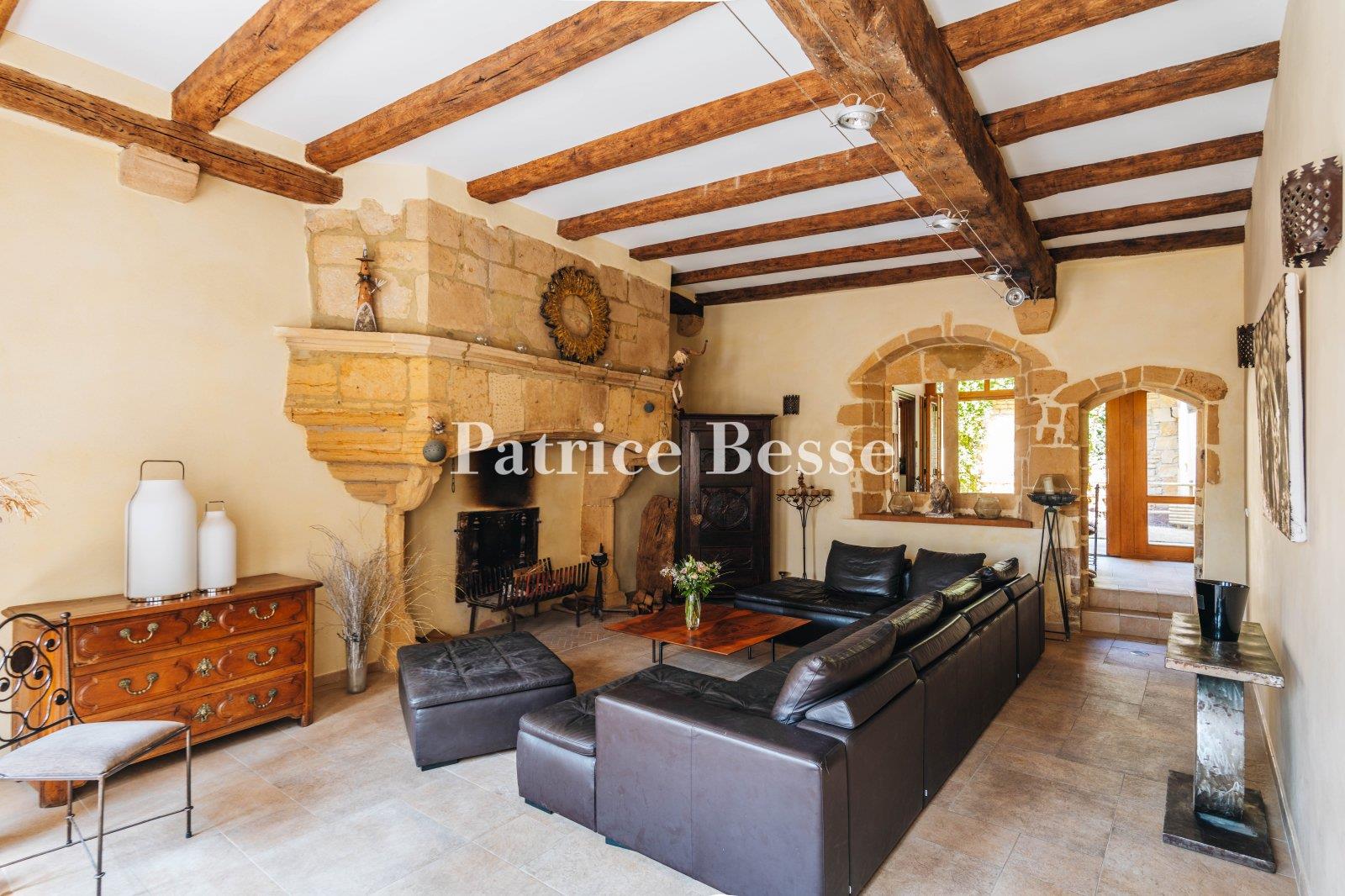A renovated 14th-century dwelling with an interior courtyard and medieval tower, in the middle of a