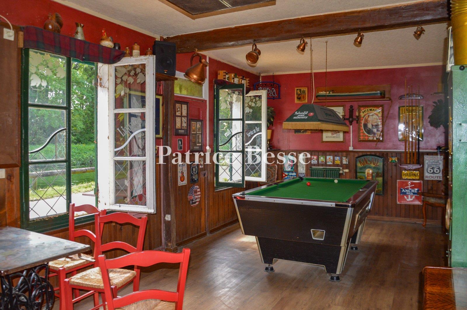 A waterside house and Scottish-style inn, facing a canal, tucked away in the valley of the River Loi