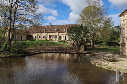 In the scenic Vienne region, in the centre of grounds crossed by a river, a traditional farmhouse wi