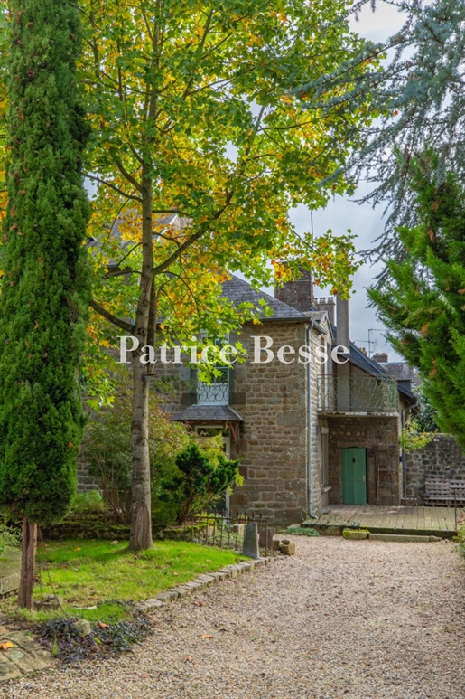 A renovated 18th-century stone house with a walled garden, beside Andaines forest in Normandy.